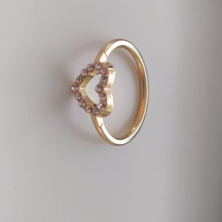 Anillo dorado con forma de corazón cubierto de circonitas rosas
