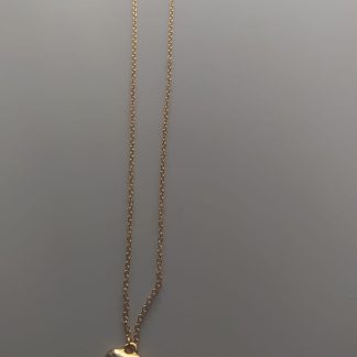 Collar dorado con colgante de corazón dorado abombado
