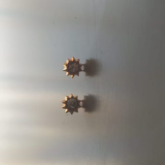 Pendientes de estrella dorada de ocho puntas con circonita