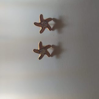 Pendientes en forma de estrella de mar dorada con circonita