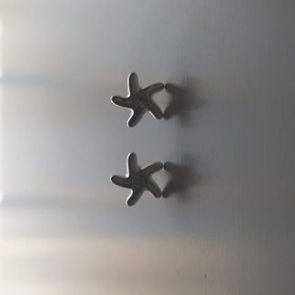 Pendientes plateados en forma de estrella