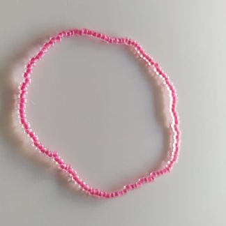 Pulsera artesanal de cuentas rosa fucsia brillante