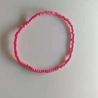 Tobillera de abalorios de color rosa fucsia